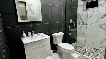 Shower, rainfall showerhead, toilet paper