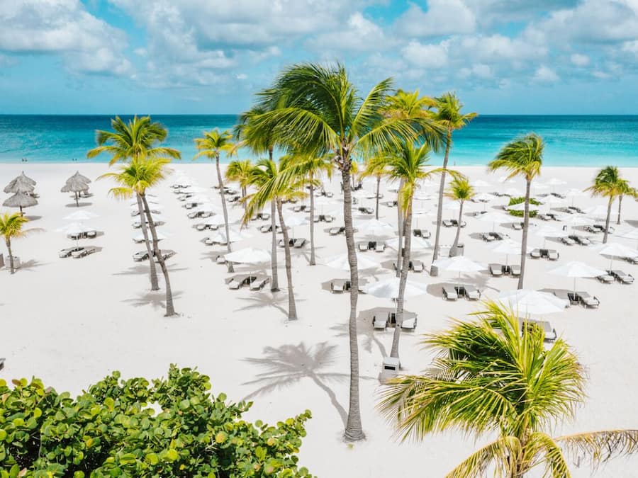 Beach nearby, white sand, beach shuttle, beach umbrellas