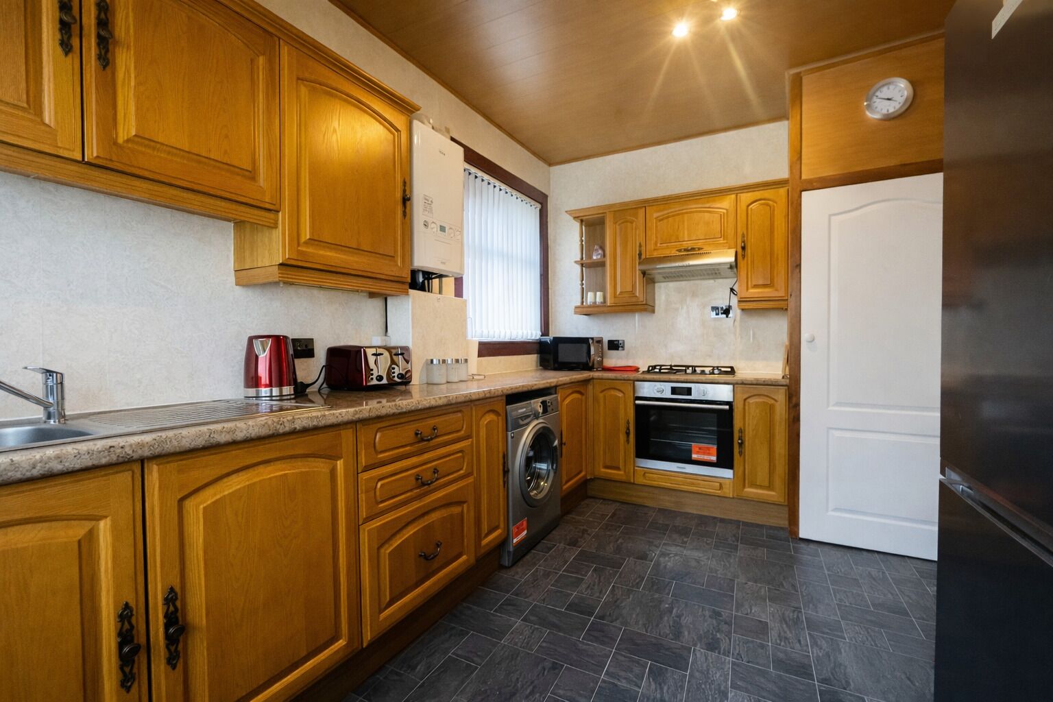 Microwave, stovetop, toaster, cookware/dishes/utensils