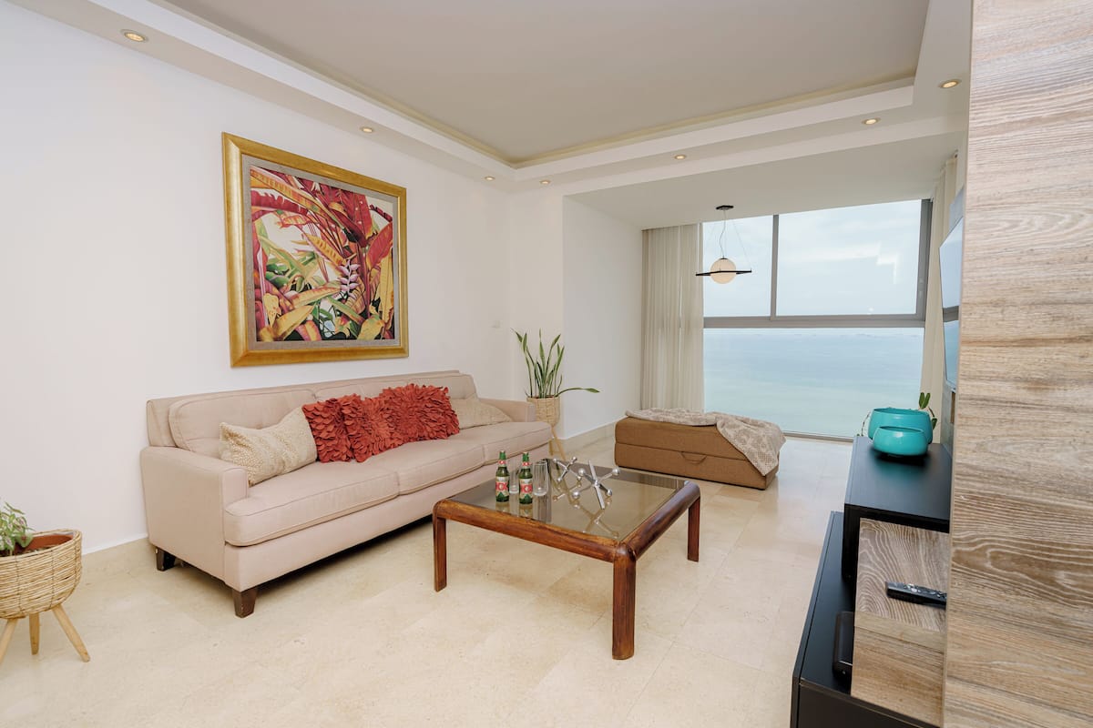 Deluxe Apartment, 2 Bedrooms | Living area | Smart TV