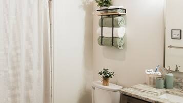 Hair dryer, towels, soap, shampoo