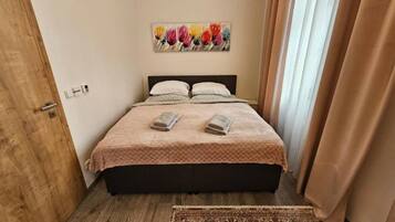 2 chambres, fer et planche à repasser, Wi-Fi, draps fournis