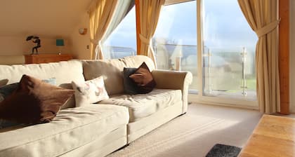 Four bedroom holiday lodge with onsite watersports.