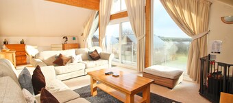 Four bedroom holiday lodge with onsite watersports.