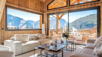 Smart TV, fireplace, foosball, books