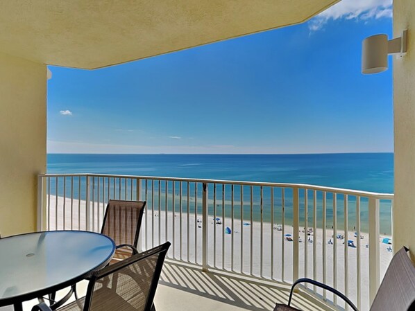 A balcony with a view of the beach and ocean. - Boardwalk #1008 by Resort Collection (Panama City Beach)