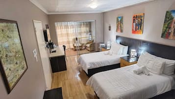 Junior Twin Room | 2 bedrooms, in-room safe, laptop workspace, iron/ironing board