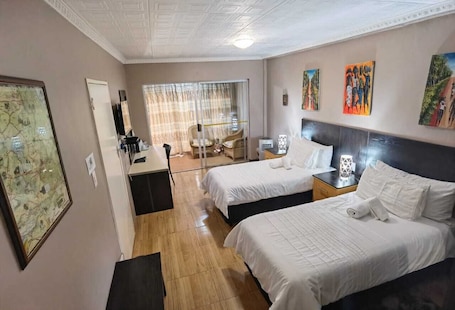 Junior Twin Room | 2 bedrooms, in-room safe, laptop workspace, iron/ironing board