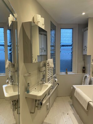 Hair dryer, towels, soap, toilet paper