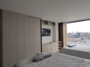 Studio, vue ville | Coin séjour