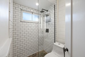 Shower, eco-friendly toiletries, hair dryer, towels