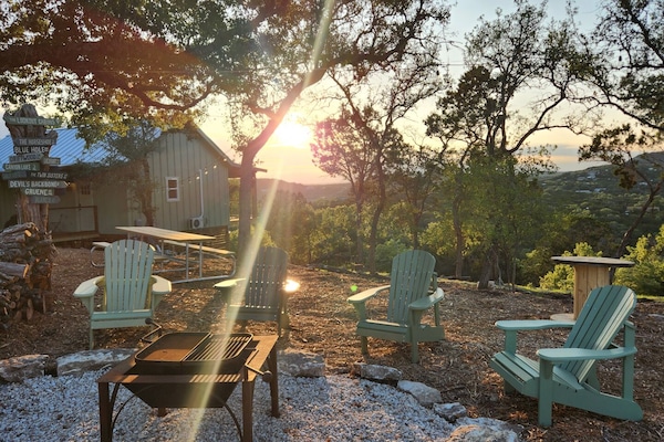 Beautiful hilltop sunset views from the deck and firepit area