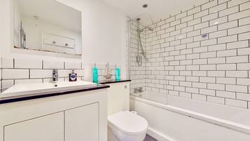 Eco-friendly toiletries, hair dryer, towels, soap