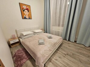 2 habitaciones, tabla de planchar con plancha, wifi y ropa de cama