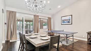 Deluxe House, Patio | Living area | TV