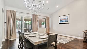 Deluxe House, Patio | Living area | TV