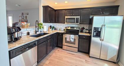 1 King Bed + 1 Queen Bed + 2 Full Bathrooms Kitchen + Laundry Room + Patio