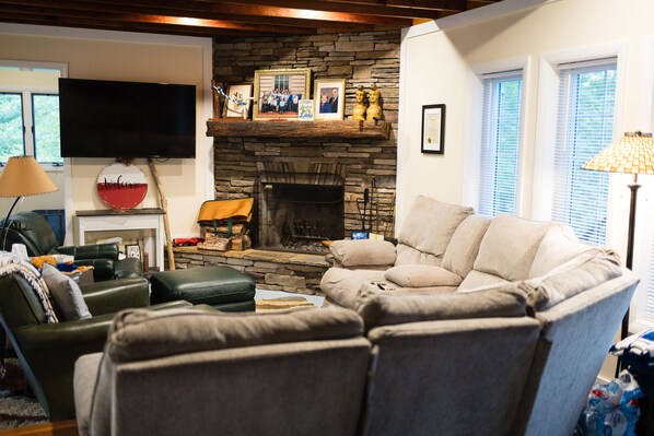Smart TV, fireplace, books