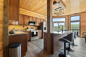 Fridge, microwave, oven, stovetop - One of a Kind Cabin. Breath Taking View, integrated into the natural rock. (Rogers)