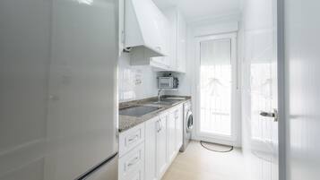Apartamento | Cocina privada | Trona infantil