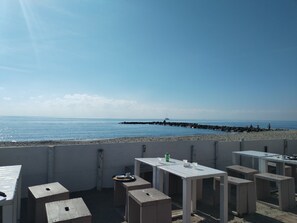Outdoor dining - Toscanelli Room apartment by the sea (Lido di Ostia)