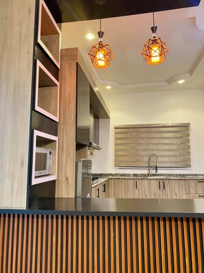 Double Room | Private kitchen | Mini-fridge, microwave, stovetop, cookware/dishes/utensils - BA2 Homes (Abuja)