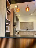 Double Room | Private kitchen | Mini-fridge, microwave, stovetop, cookware/dishes/utensils