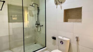 Shower, towels, soap, toilet paper