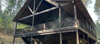 Forest Seclusion Sleeping 10.  Hot Tub, Pets, WIFI and Geothermal Pool Access!