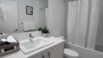 Jetted tub, hair dryer, towels, soap