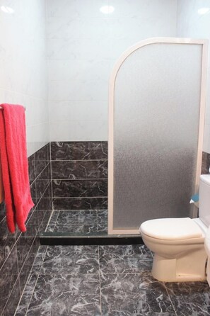 Deluxe Apartment, Balcony, City View | Bathroom | Free toiletries, towels, soap, toilet paper