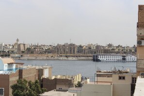 Deluxe Apartment, Balcony, City View | Terrace/patio