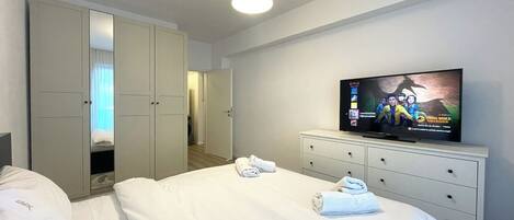 1 slaapkamer, een strijkplank/strijkijzer, wifi, beddengoed