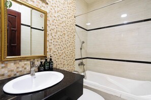Standard Room | Bathroom | Shower, hair dryer, slippers, towels - Cactusland Hotel Tan Binh (Ho Chi Minh City)