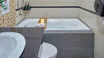 Standard Room | Bathroom | Shower, hair dryer, slippers, towels