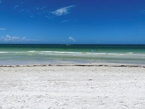 On the beach, sun-loungers, beach towels