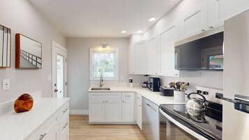 Coffee/tea maker, fridge, microwave, dishwasher