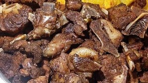 A meal with grilled meat and yellow potatoes, served with two types of salsa. - mirok gardens kisumu (Kisumu)