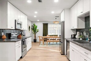 Fridge, microwave, dishwasher, coffee/tea maker