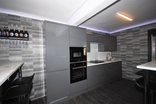 Fridge, microwave, dishwasher, coffee/tea maker