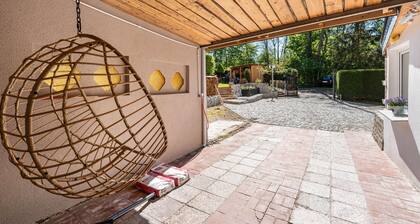 Casa de vacaciones 'Feriehaus1856de' con sauna, jardín comunitario y Wi-Fi