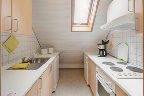 Réfrigérateur, four, plaque de cuisson, lave-vaisselle