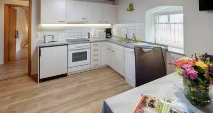 Ferienwohnung 'Löwenzahn' mit Gemeinschaftsterrasse, Gemeinschaftsgarten und Wi-Fi