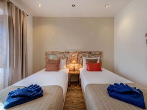 2 slaapkamers, een strijkplank/strijkijzer, reisbedje, gratis wifi