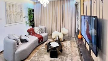 Economy Apartment, Balcony, City View | Ruang tamu