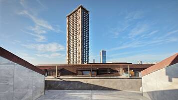 Desk, laptop workspace, free WiFi, bed sheets