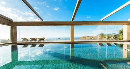 Villa Kalithea, with indoor heating pool, unlimited sunset views to the ocean.