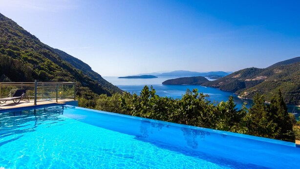 A swimming pool with a view of a coastal landscape. - Villa Inna With 3 Bedrooms and 4 Bathrooms (Lefkada)