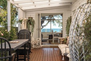 Outdoor dining - 3-Bedroom Getaway Minutes from the Beach (Penguin)