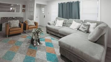 Télévision, cheminée, jeux vidéo, baby-foot